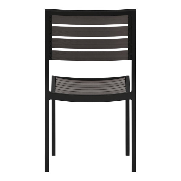A black and grey Flash Furniture Lark stackable side chair with a faux wooden slat back.