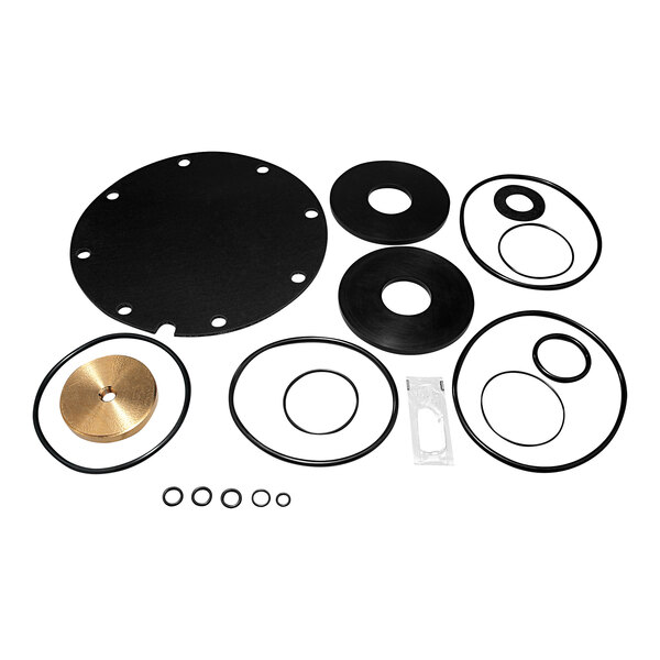 A Watts rubber repair kit with black circular gaskets and parts.