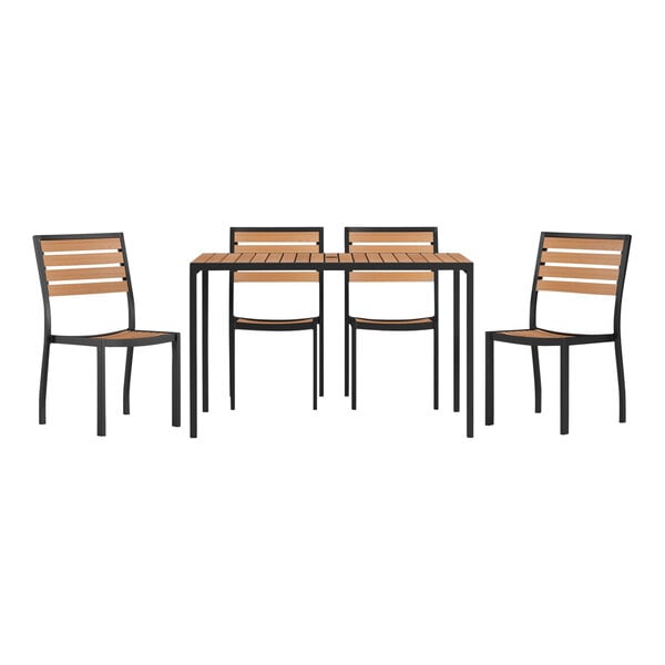 A Flash Furniture rectangular natural faux teak table with a black frame and four chairs with a wood back and black frame.