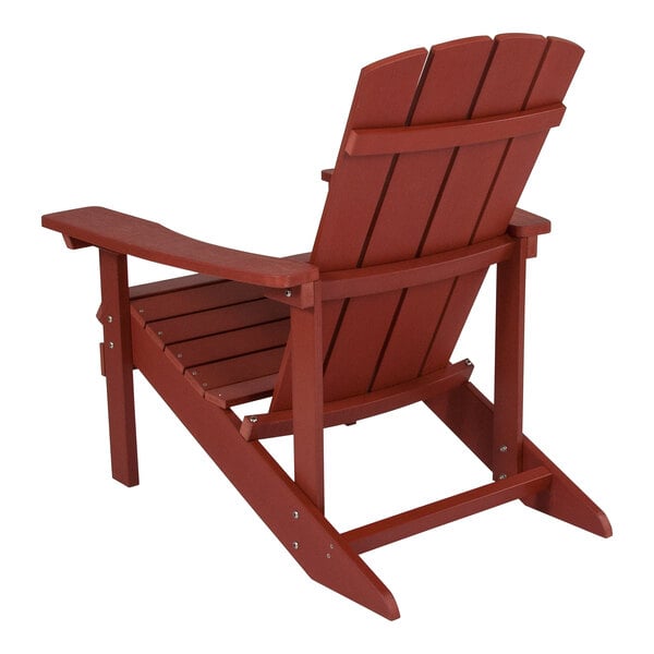 A red Flash Furniture Charlestown Adirondack chair with armrests and a wooden seat.
