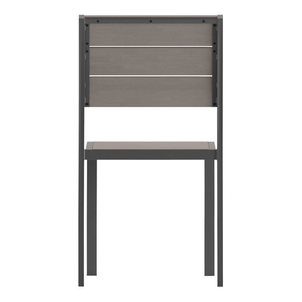 A gray outdoor side chair with a faux teak slat backrest.