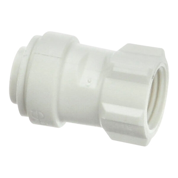 A white plastic pipe fitting for Manitowoc Ice machines.