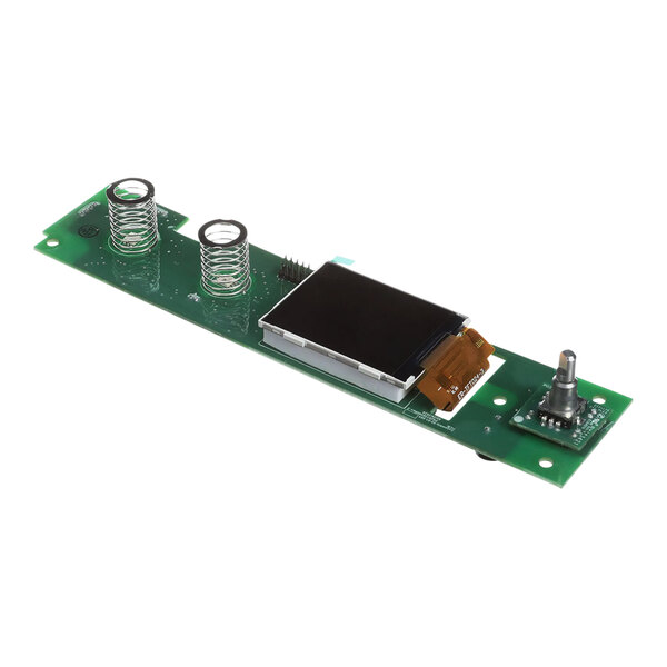 A green circuit board with two small black rectangular components.