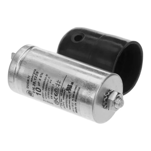A close-up of a Manitowoc Ice capacitor with black and white caps.