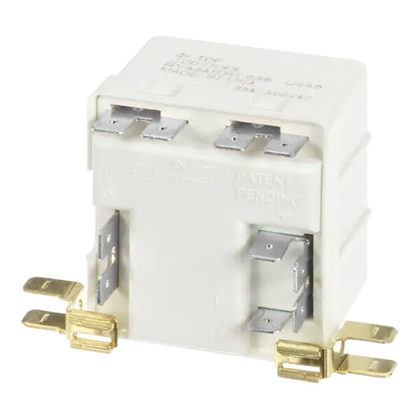 A white Manitowoc Ice start relay with two gold terminals.