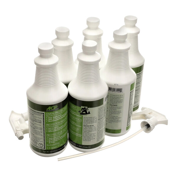 A group of white Amana commercial microwave cleaning product bottles with green labels.