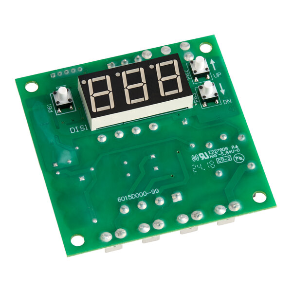 A green electronic control board with a digital display and push buttons, used for temperature control in Hatco equipment.