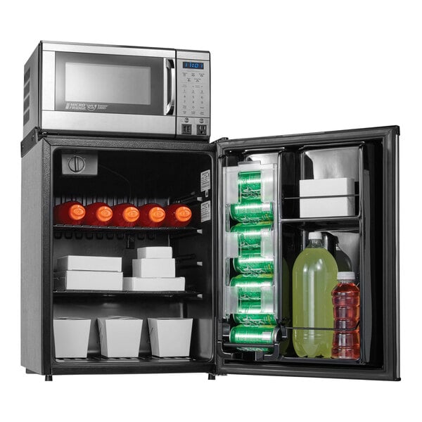 A Danby stainless steel MicroFridge with a door open.