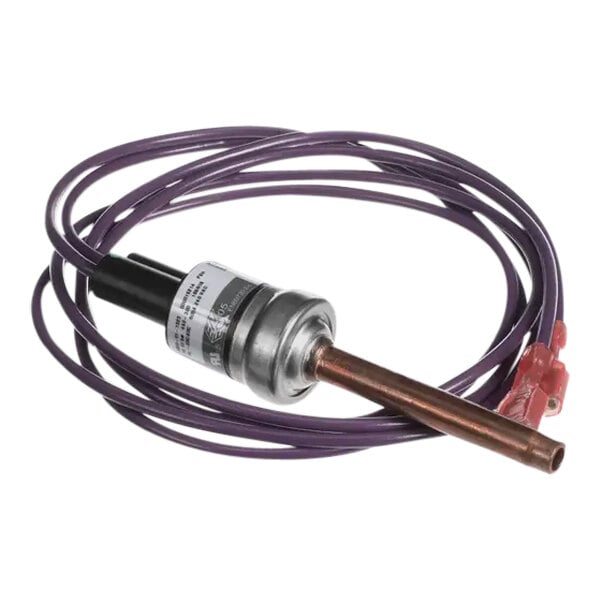 A close-up of a Manitowoc Ice pressure switch with a purple cable.