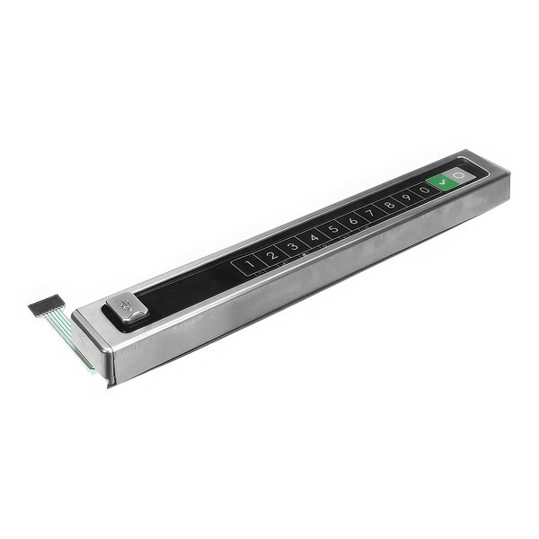 A rectangular metal touch panel with buttons and a green and black display.