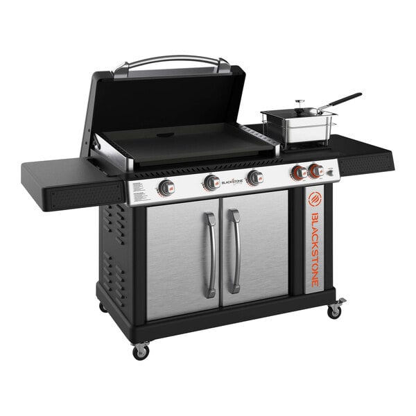 A Black Blackstone Liquid Propane Outdoor Griddle with Rangetop Burner on a white background.