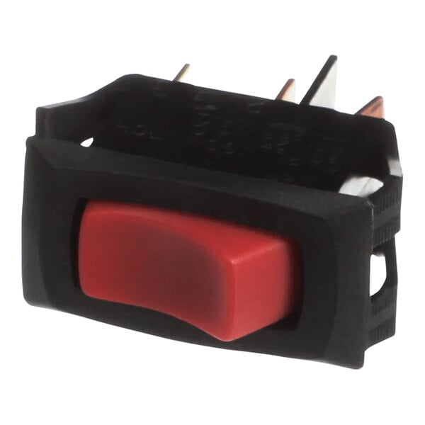 A red power switch with a red button.