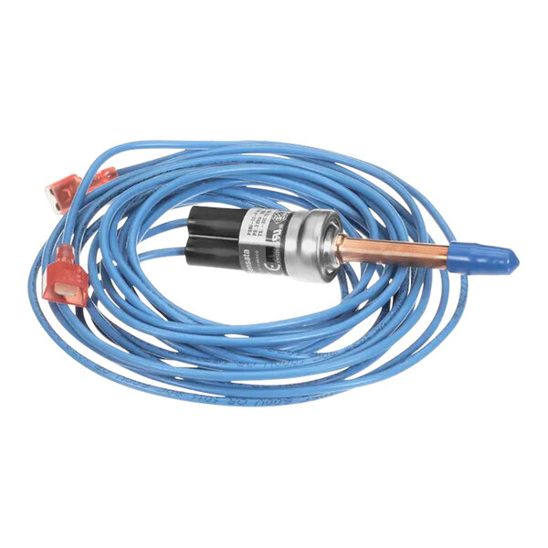 A blue cable with a metal cylinder connected to a Manitowoc Ice pressure switch.