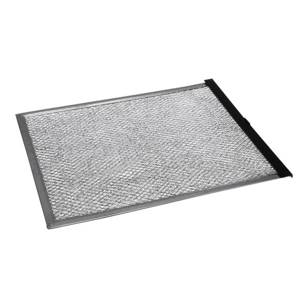 A close-up of a Manitowoc Ice air filter with a metal mesh.