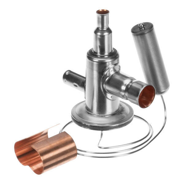 A Manitowoc Ice expansion valve with copper fittings.