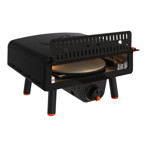 A black and orange Blackstone Leggero Liquid Propane outdoor pizza oven.