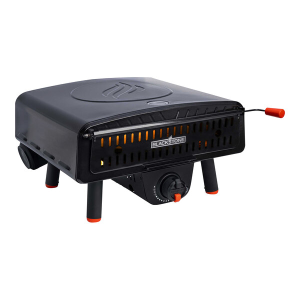A Blackstone Leggero Liquid Propane Outdoor Pizza Oven on a table outdoors.