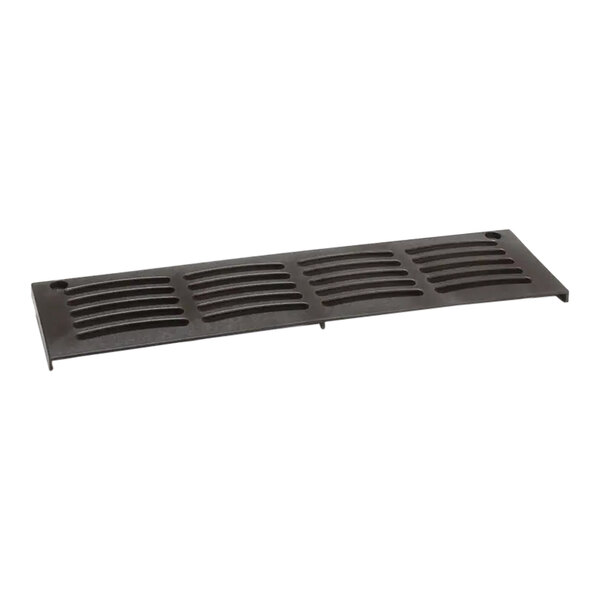 A black metal Manitowoc Ice front grill with holes.