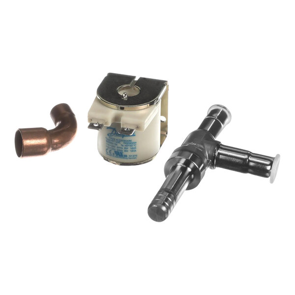 A Manitowoc Ice service valve solenoid with copper pipes.