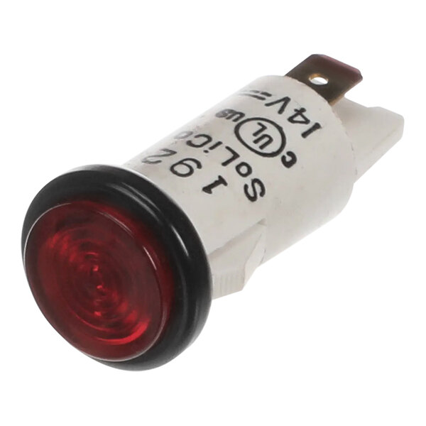 A close-up of a white and red tube with a red light inside.