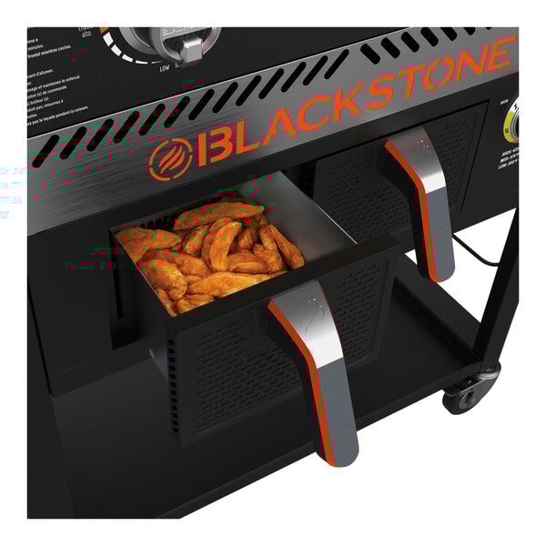 A Blackstone liquid propane griddle with a tray of chicken cooking over a black and silver air fryer.