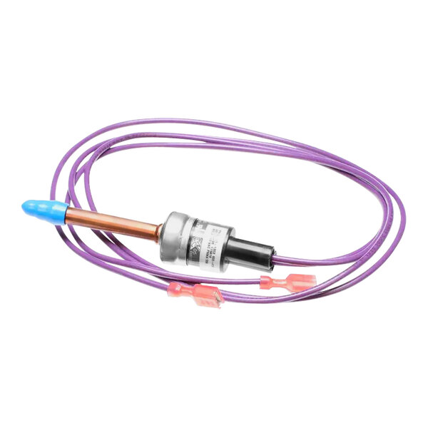 A purple wire with a metal handle attached to a copper tube.