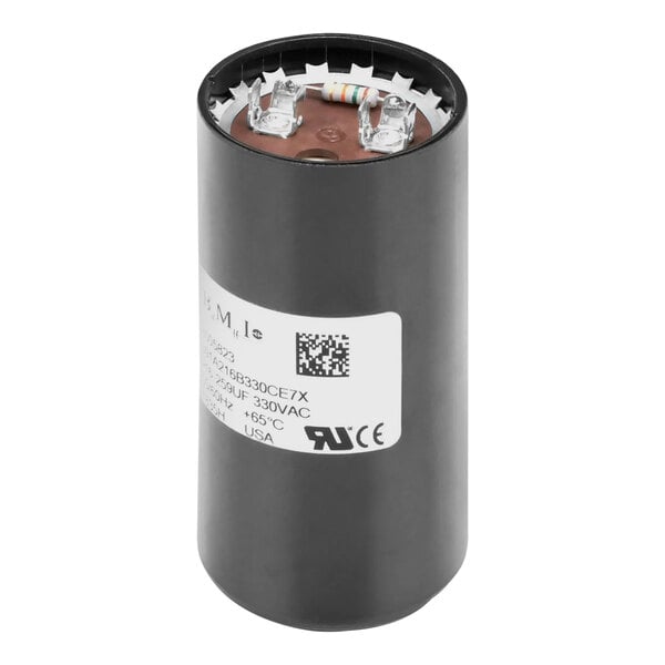 A black cylinder capacitor with white label.