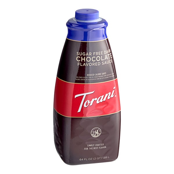 A close up of a Torani Sugar-Free Dark Chocolate Flavoring Sauce bottle with a blue lid.