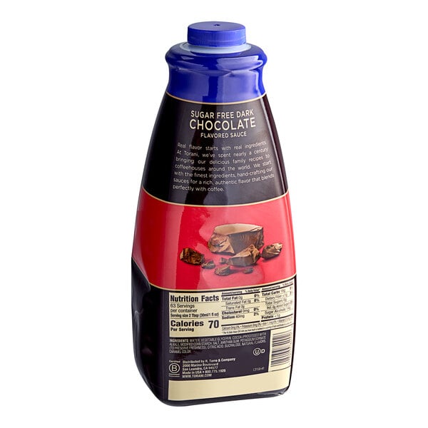 A close-up of a Torani Sugar-Free Dark Chocolate Flavoring Sauce bottle.