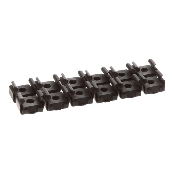 A row of black plastic Manitowoc Ice cage nuts.