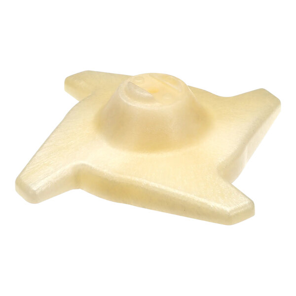 A white plastic star shaped Manitowoc Ice wheel.