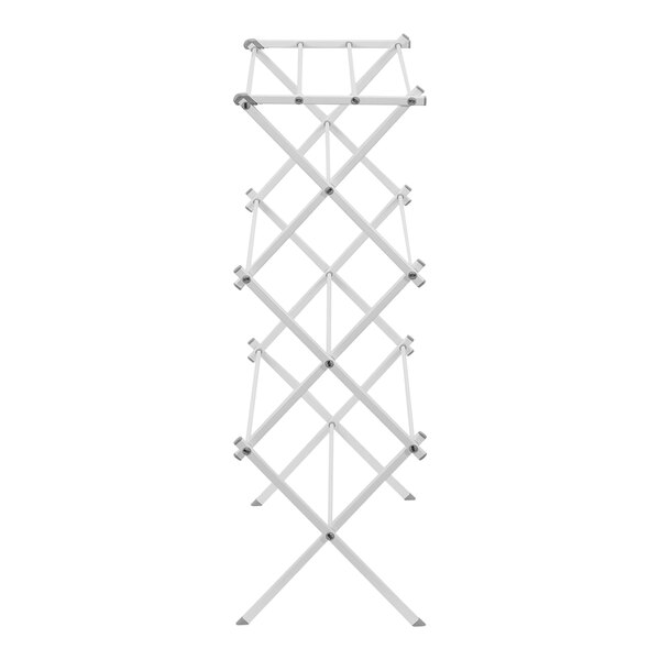 A white folding Household Essentials clothes drying rack with silver legs.