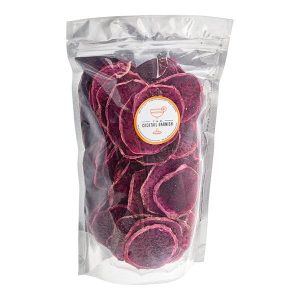 A case of dried red dragon fruit slices.