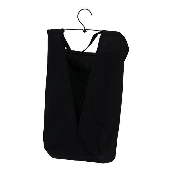 A black canvas laundry bag hanging on a hook.