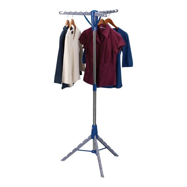 A silver and blue tripod drying rack with clothes on it.
