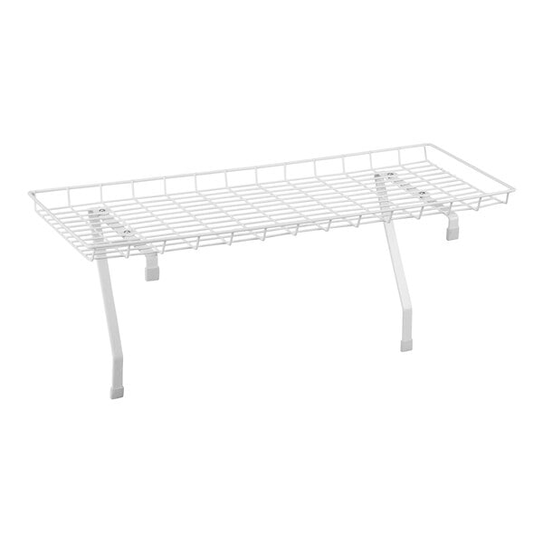 A white steel wire shelf for over the washer storage on a white background.