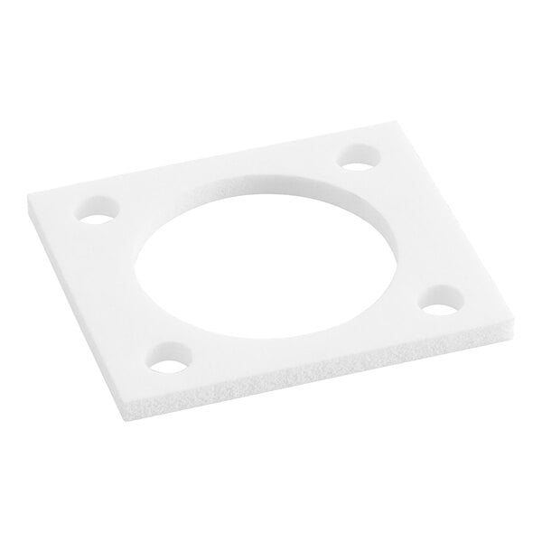 A white square spout seal with holes in it.