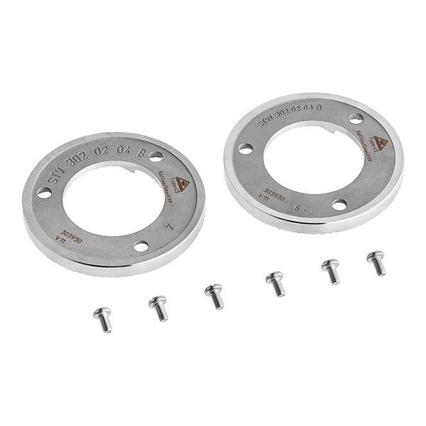 A close-up of a Mahlkonig 98mm circular metal burr set with holes.