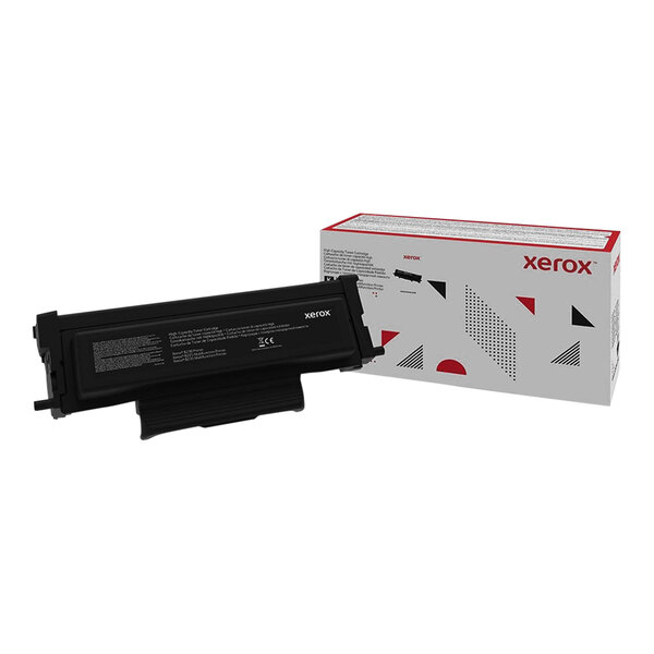 A Xerox black printer toner cartridge in a box with white text.