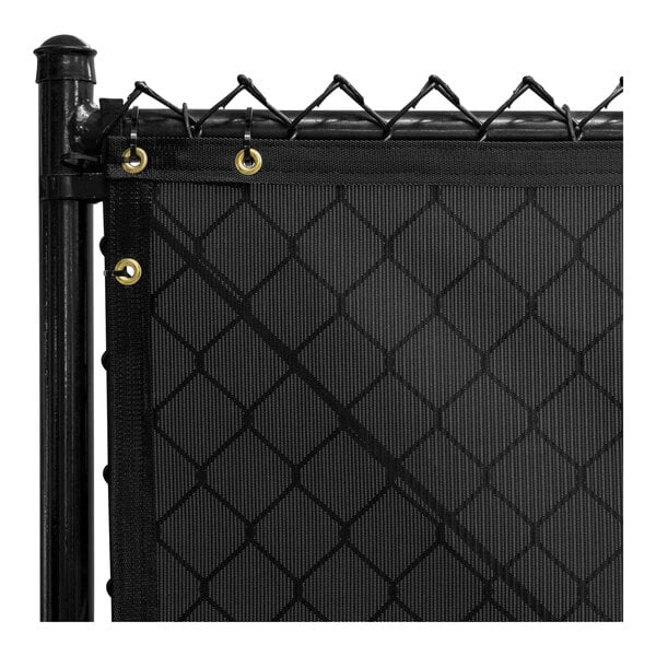 Black PVC mesh fence screen on a fence.