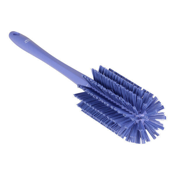 A purple Vikan medium pipe brush with bristles and a handle.