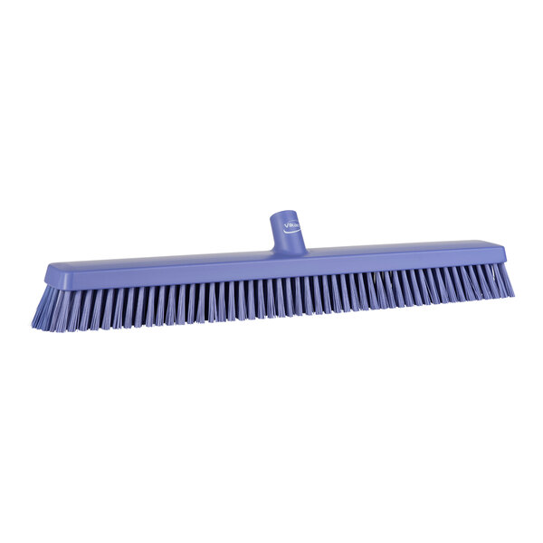 A purple Vikan heavy-duty push broom head with soft and stiff bristles.