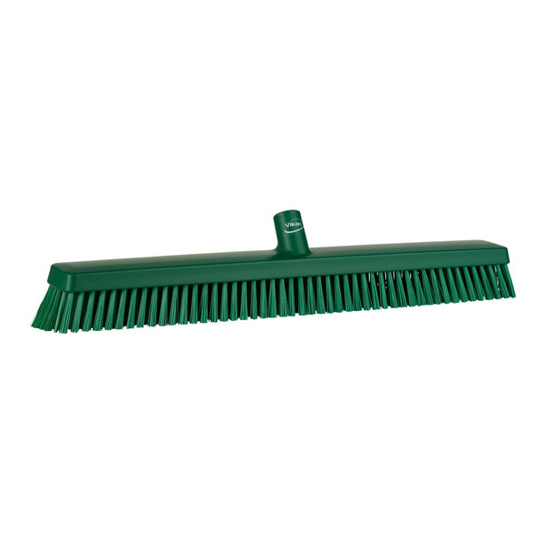 A green Vikan heavy-duty push broom head.