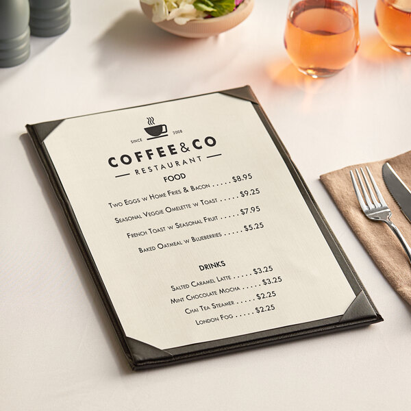 A Choice natural linen menu on a table with a fork and a plate of food.