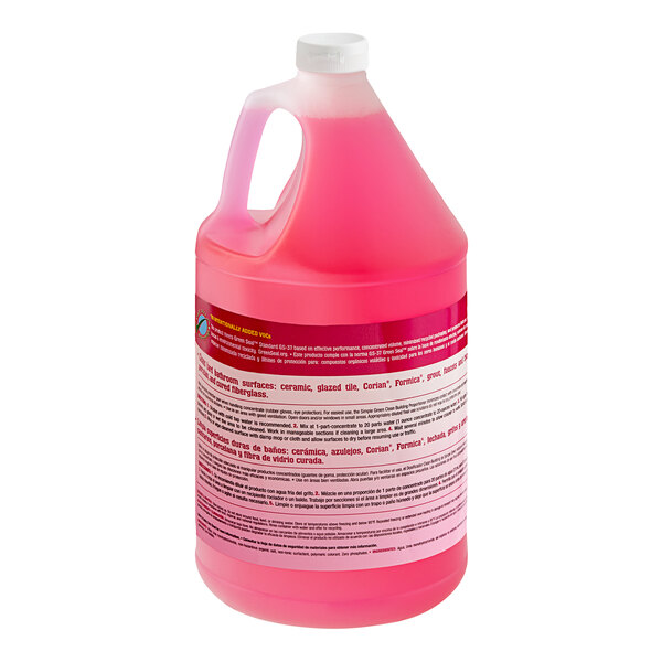 A jug of pink liquid with a pink label for Simple Green Clean Building 1210000211101 1 Gallon Concentrated Bathroom Cleaner.