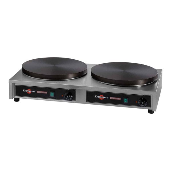 A black Krampouz dual electric crepe maker with two griddles.