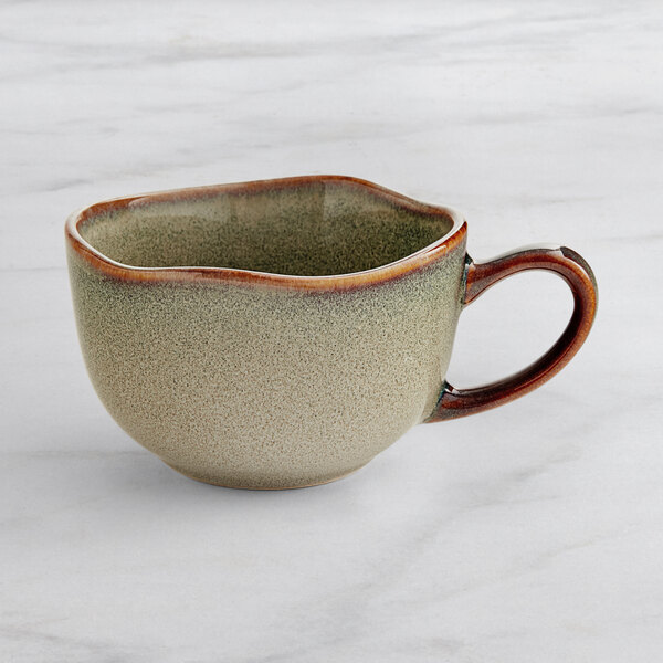 A heather gray Acopa china cup with a handle.