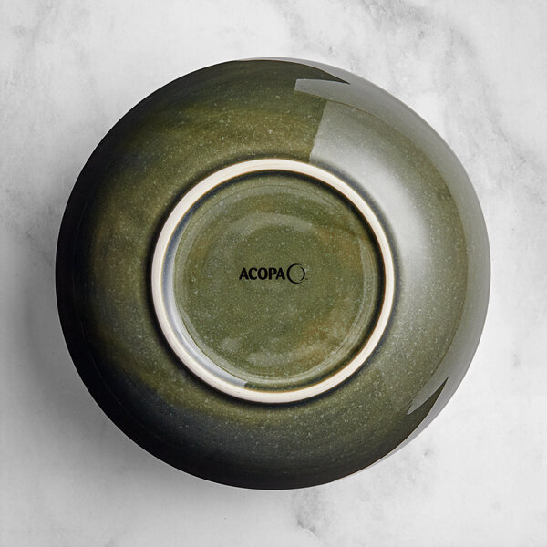 An Acopa Highlands Juniper Green china bowl with a white rim.