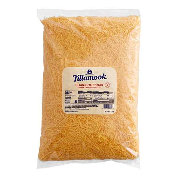 A 5 lb. bag of Tillamook shredded sharp yellow cheddar cheese.
