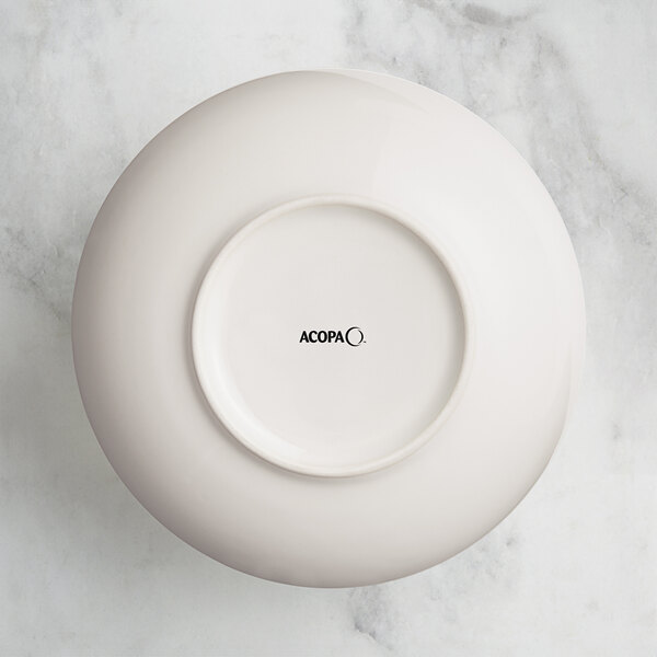An Acopa Highlands white china bowl with a circular rim.